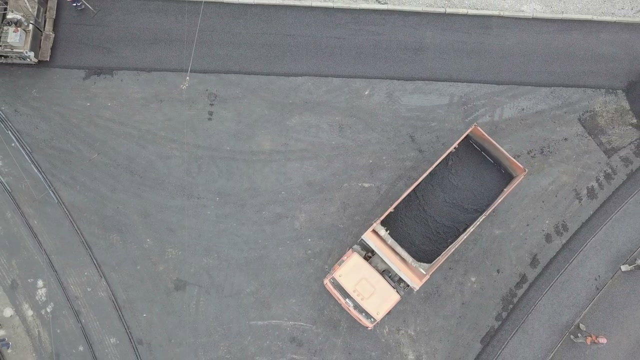Aerial Road Paving at Construction Site