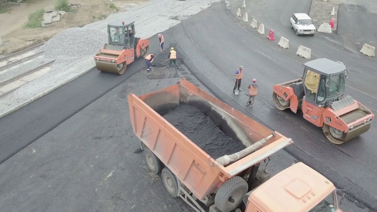 Road Paving Crew Working on New Asphalt