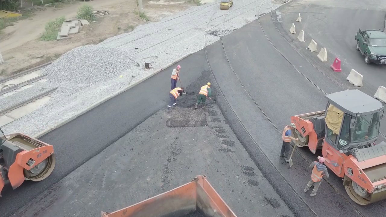 Road Construction Crew Paving New Asphalt