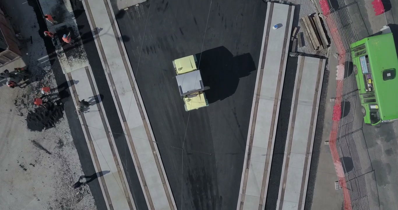 Road Roller Paving Asphalt on Construction Site