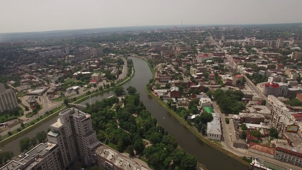 Aerial View of Cityscape with River and Park