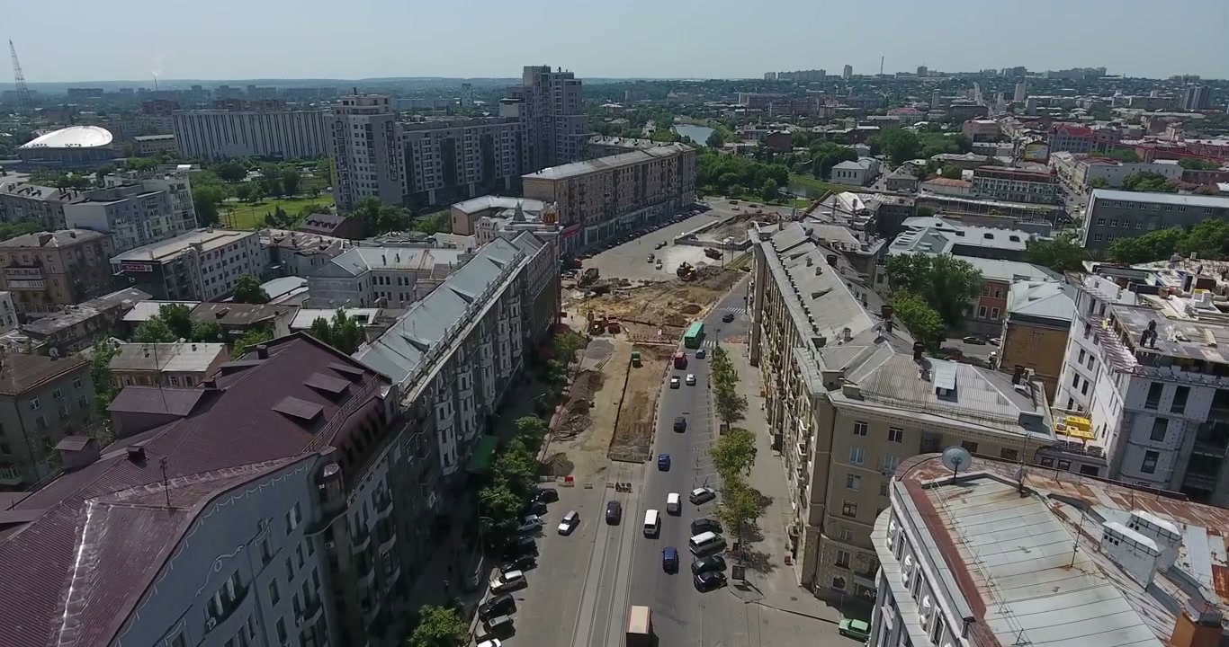 Urban Construction Site with City Traffic
