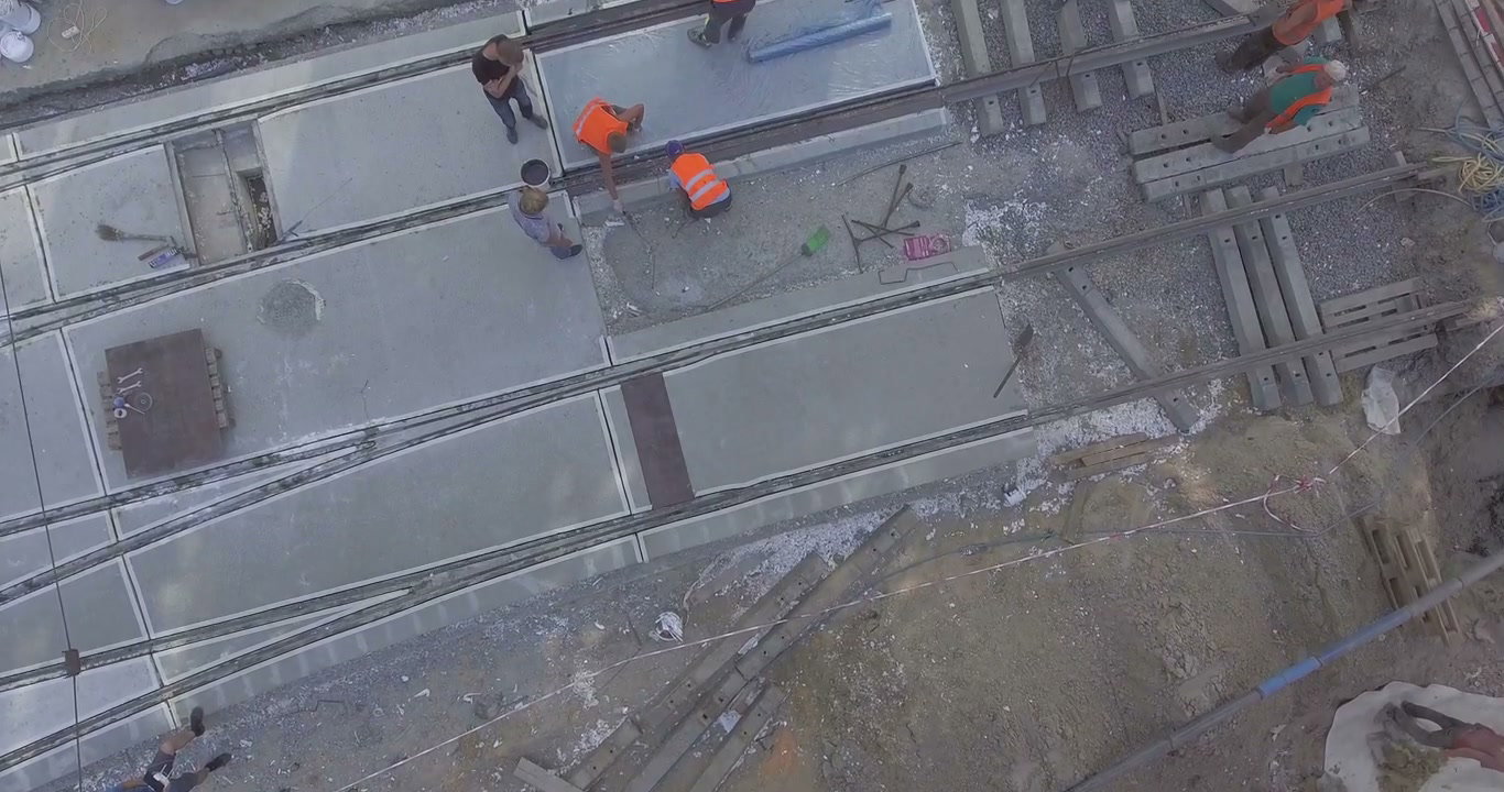 Aerial View of Workers Building Tram Tracks