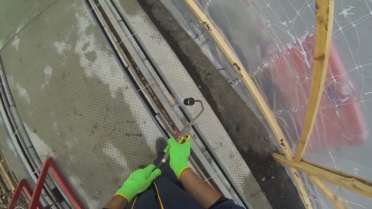 Worker Heating Metal with Blowtorch