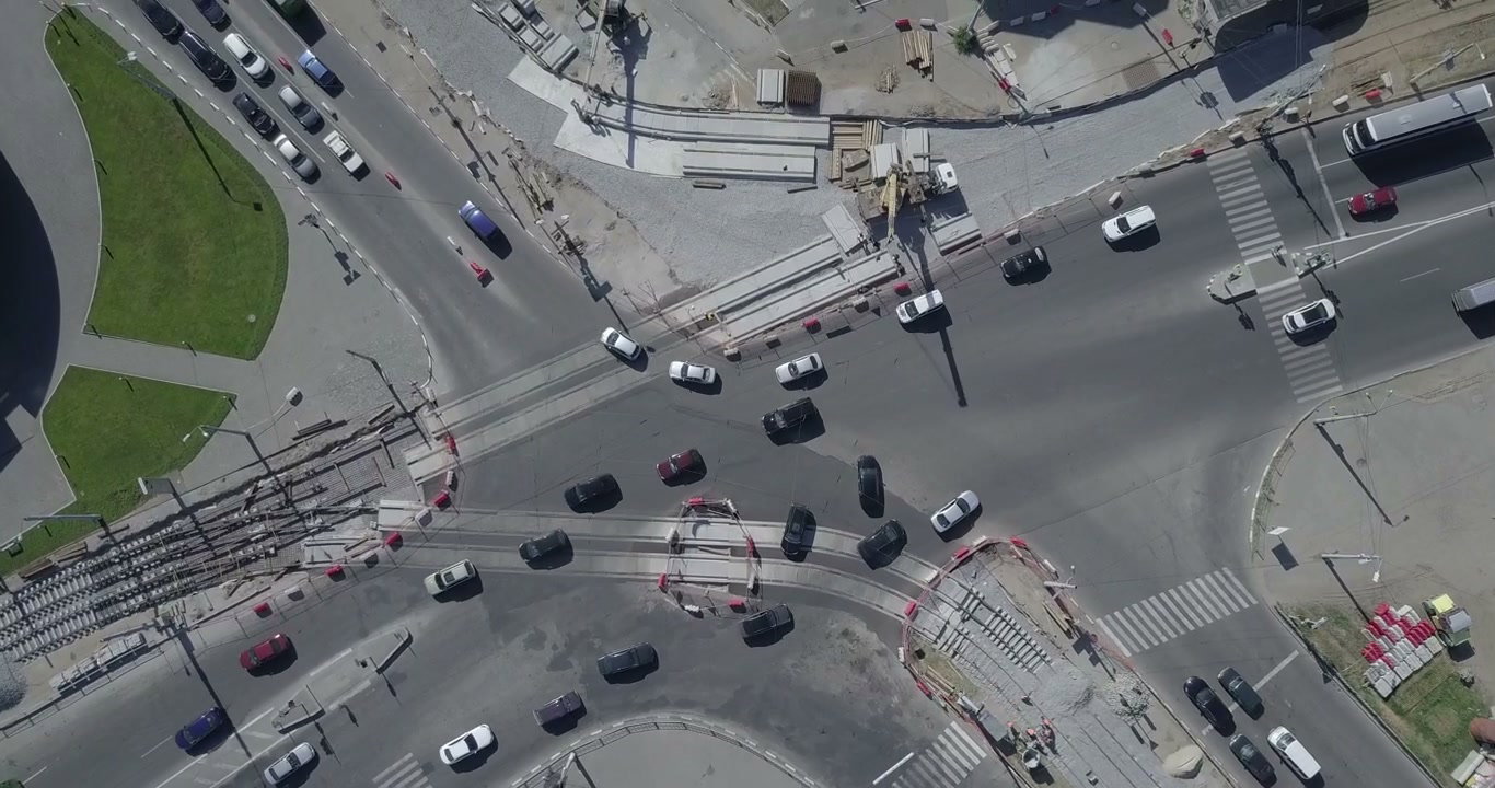 Aerial View of Urban Intersection and Tram Track Construction