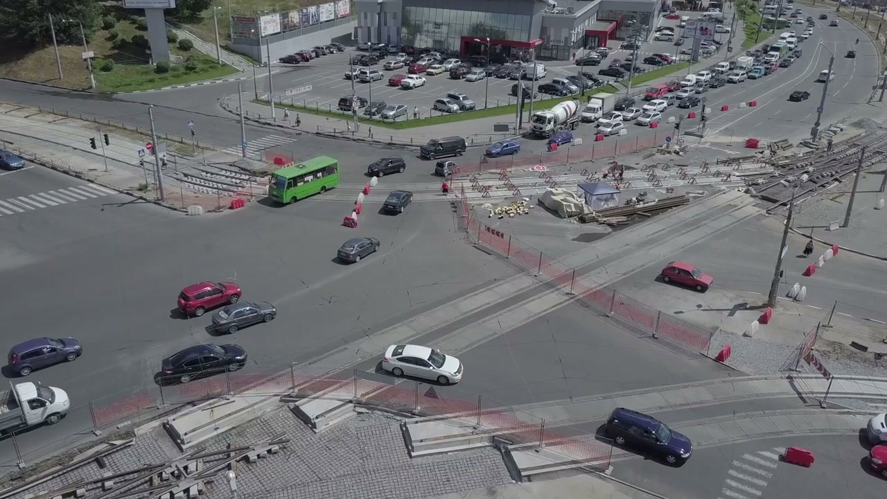 Busy City Intersection and Tram Track Construction