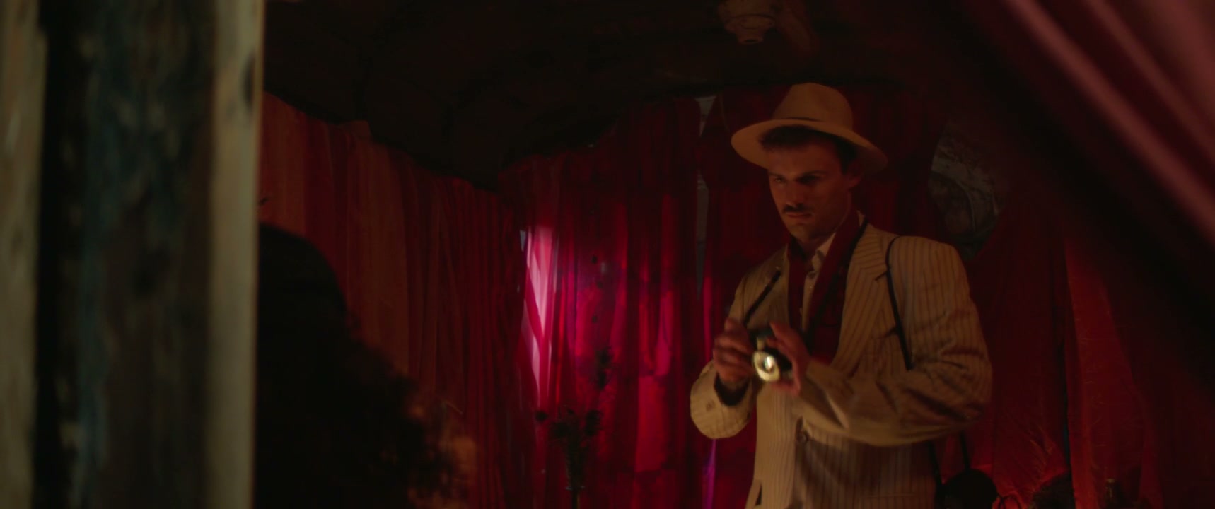 Man in Fedora Takes Flash Photo