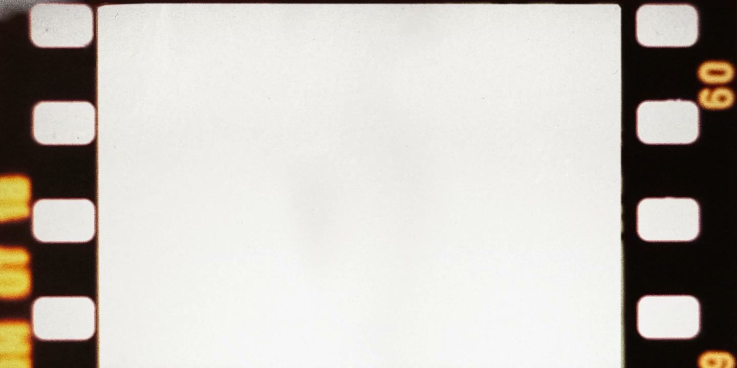 Old Film Frame with Grain and Sprockets