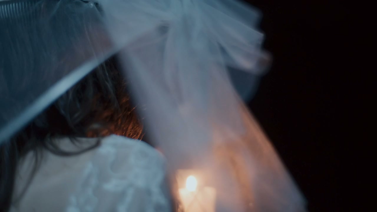 White Lady with Lantern at Night
