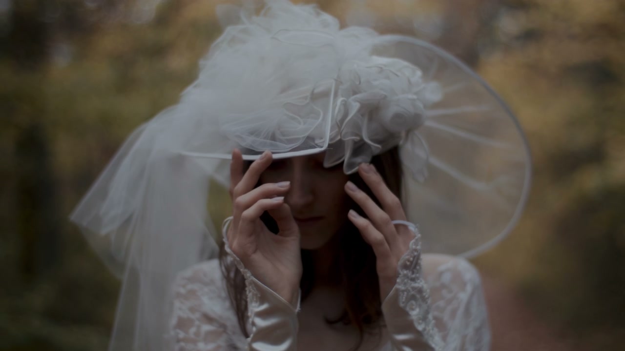 Somber Bride in Vintage Wedding Dress