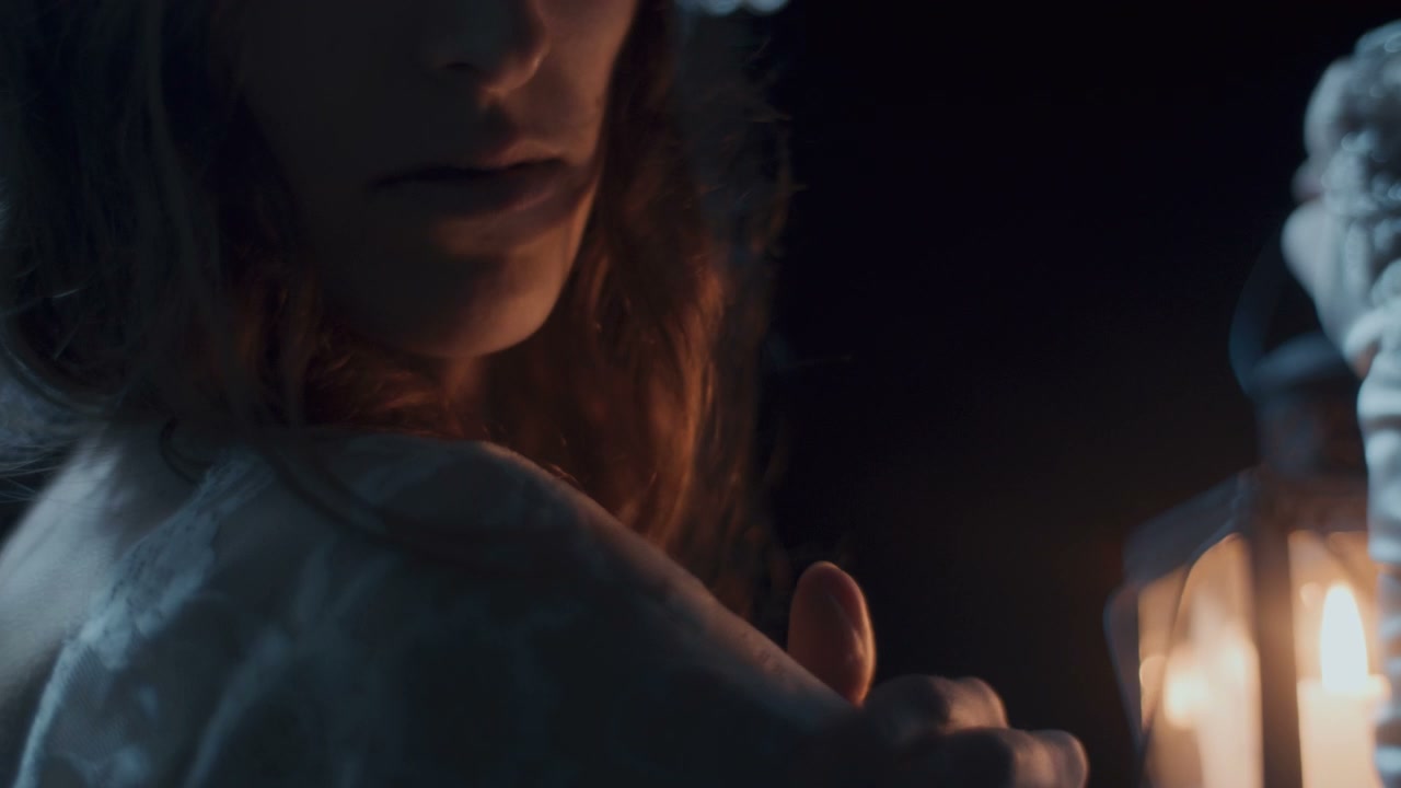 White Lady Holding Lantern