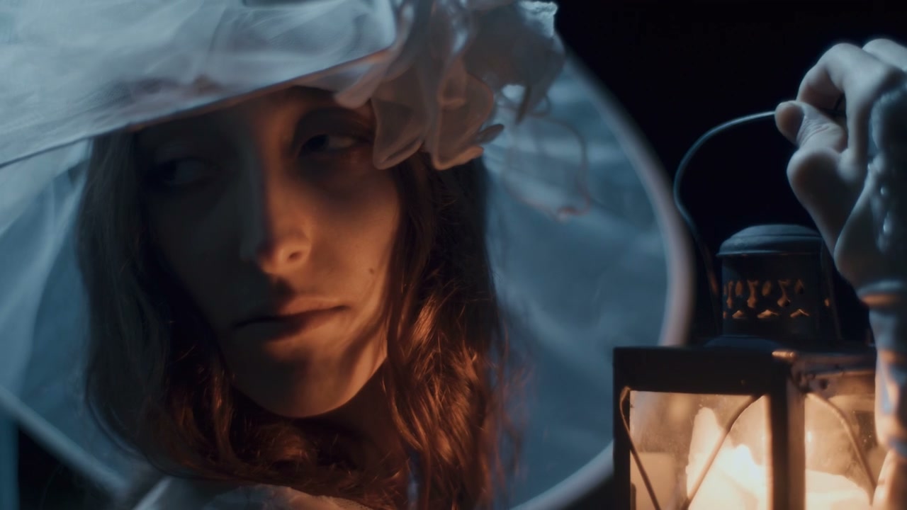 Mysterious Woman Holding Lantern
