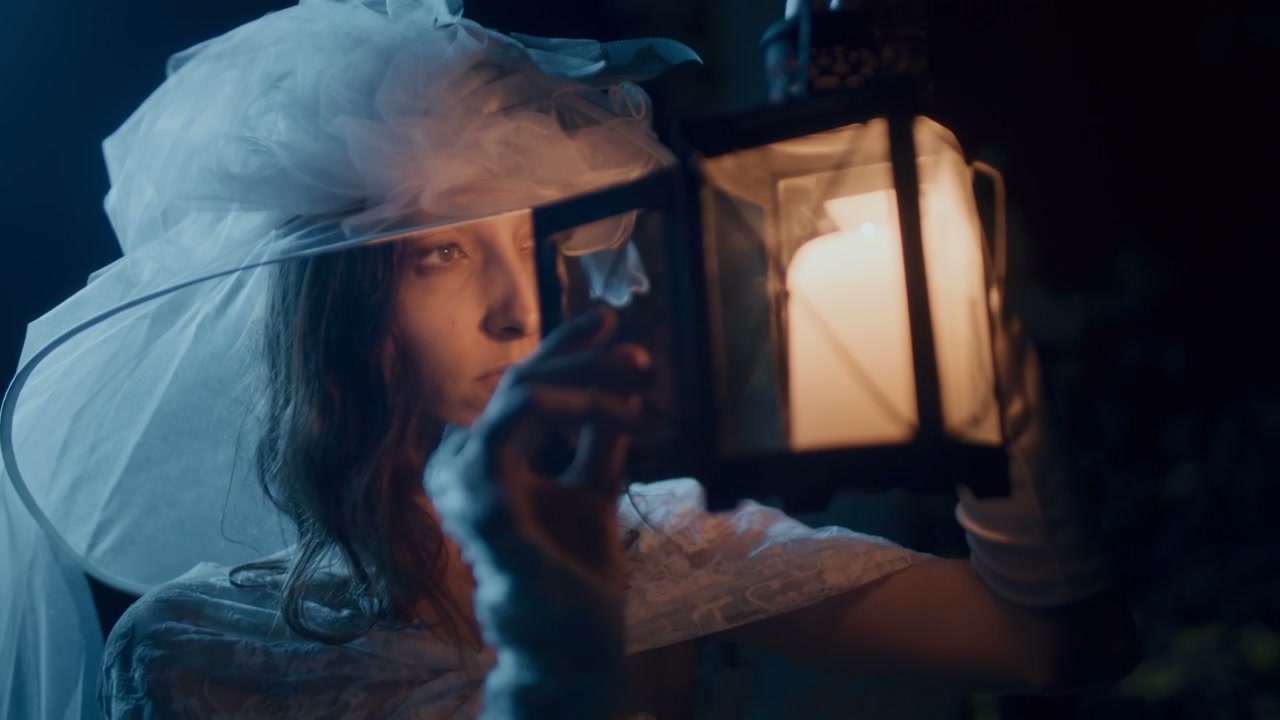 Mysterious White Lady Holding Lantern