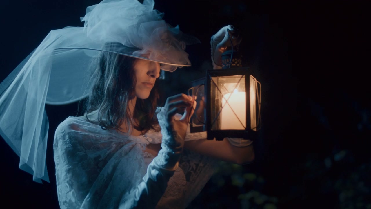 White Lady Opening Lantern at Night