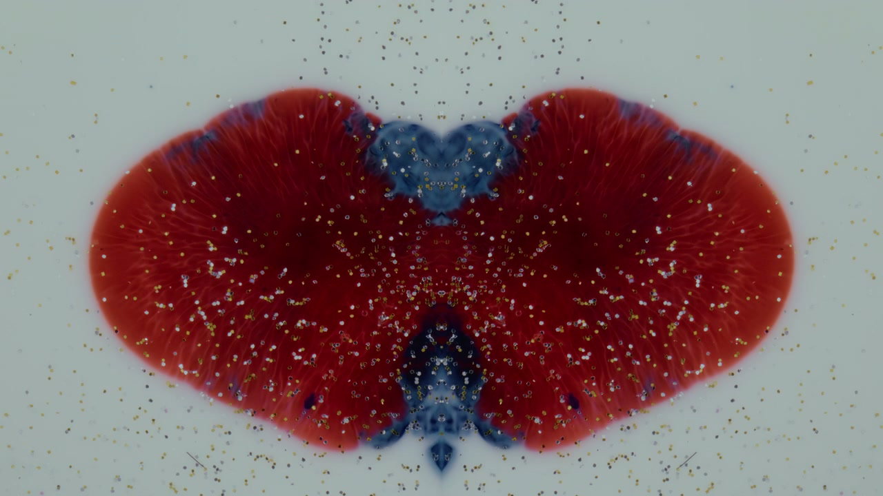Symmetrical Ink and Glitter Flow