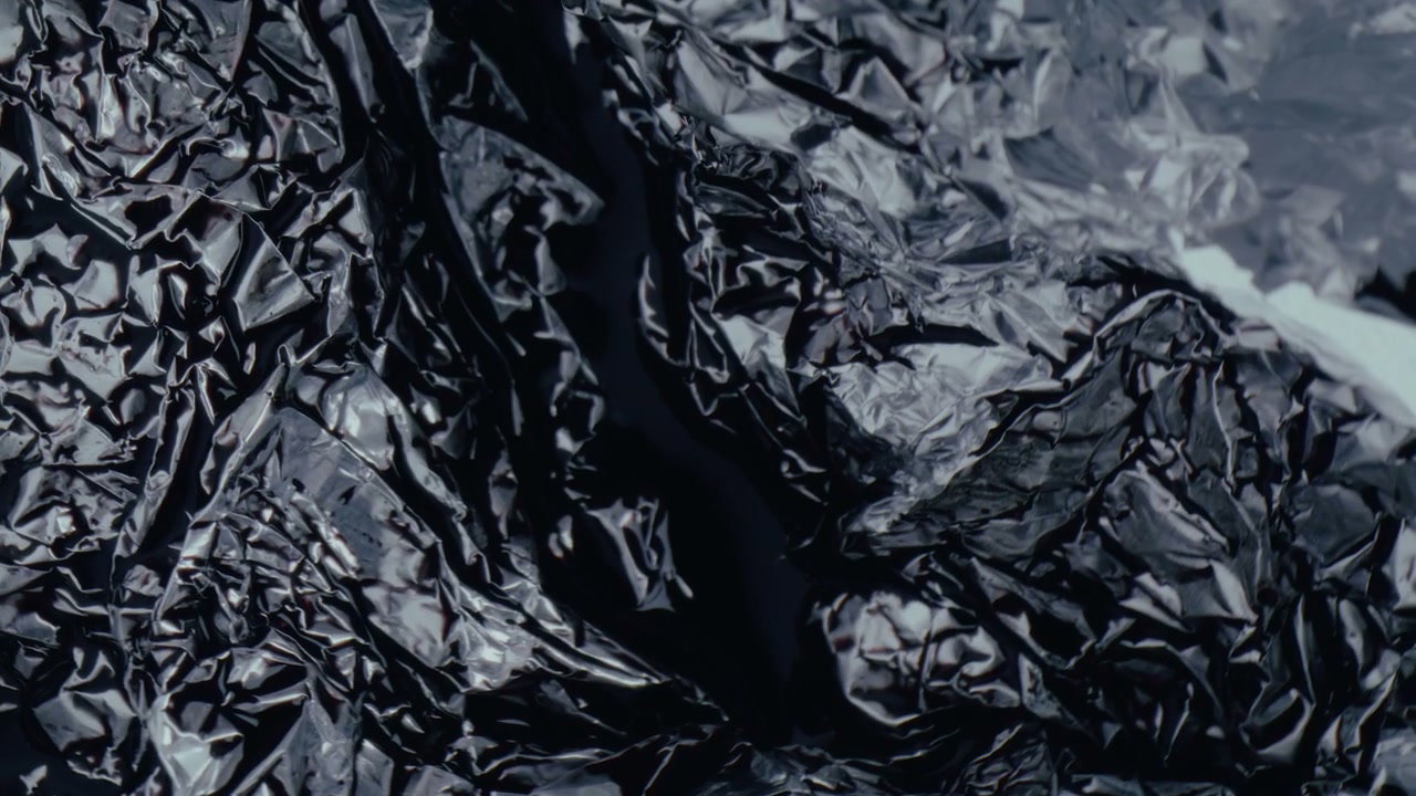 Crumpled Dark Reflective Surface