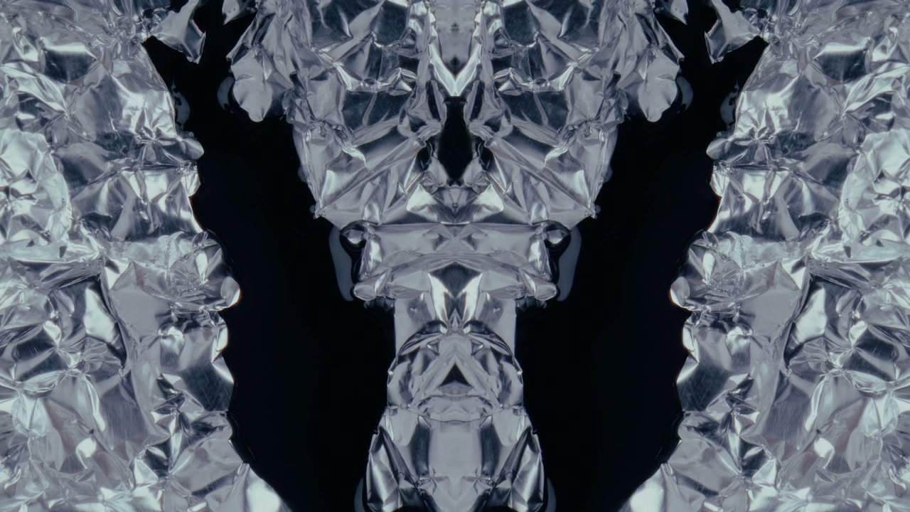 Abstract Silver Foil and Black Liquid