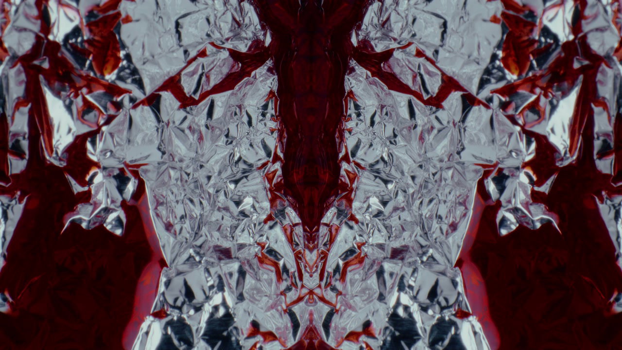 Abstract Red Liquid on Silver Foil