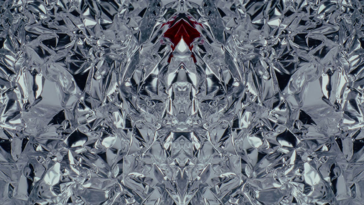 Red Liquid Spreading on Mirrored Foil