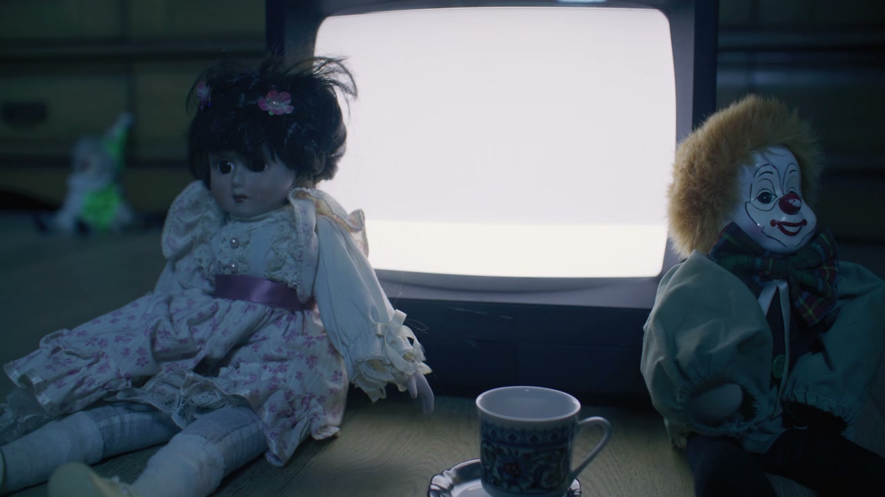 Creepy Dolls Watching Static on Old Television