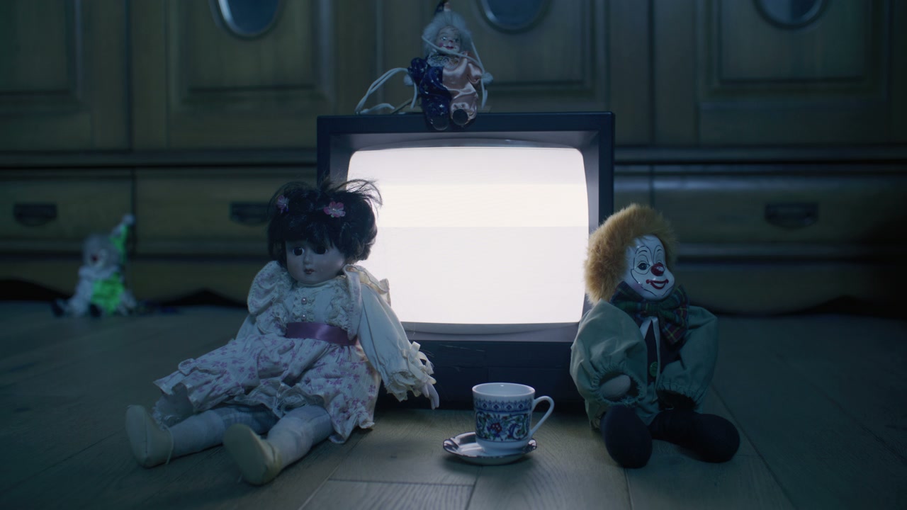 Creepy Dolls with Static Television Screen