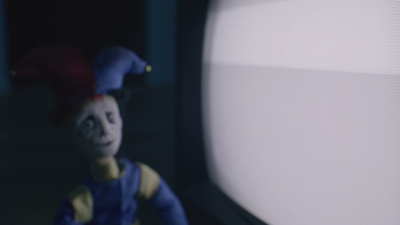 Creepy Jester Puppet and Static TV Screen