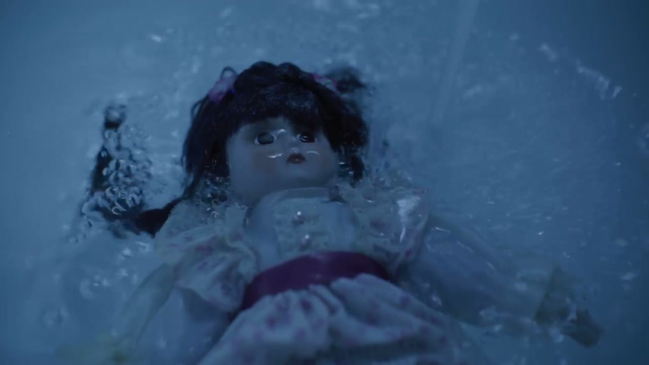 Old Porcelain Doll Submerged in Water