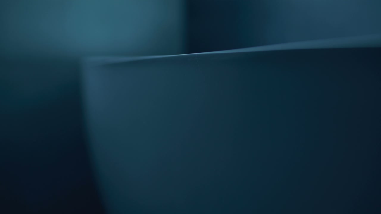 Abstract Water Pouring Over Curved Edge