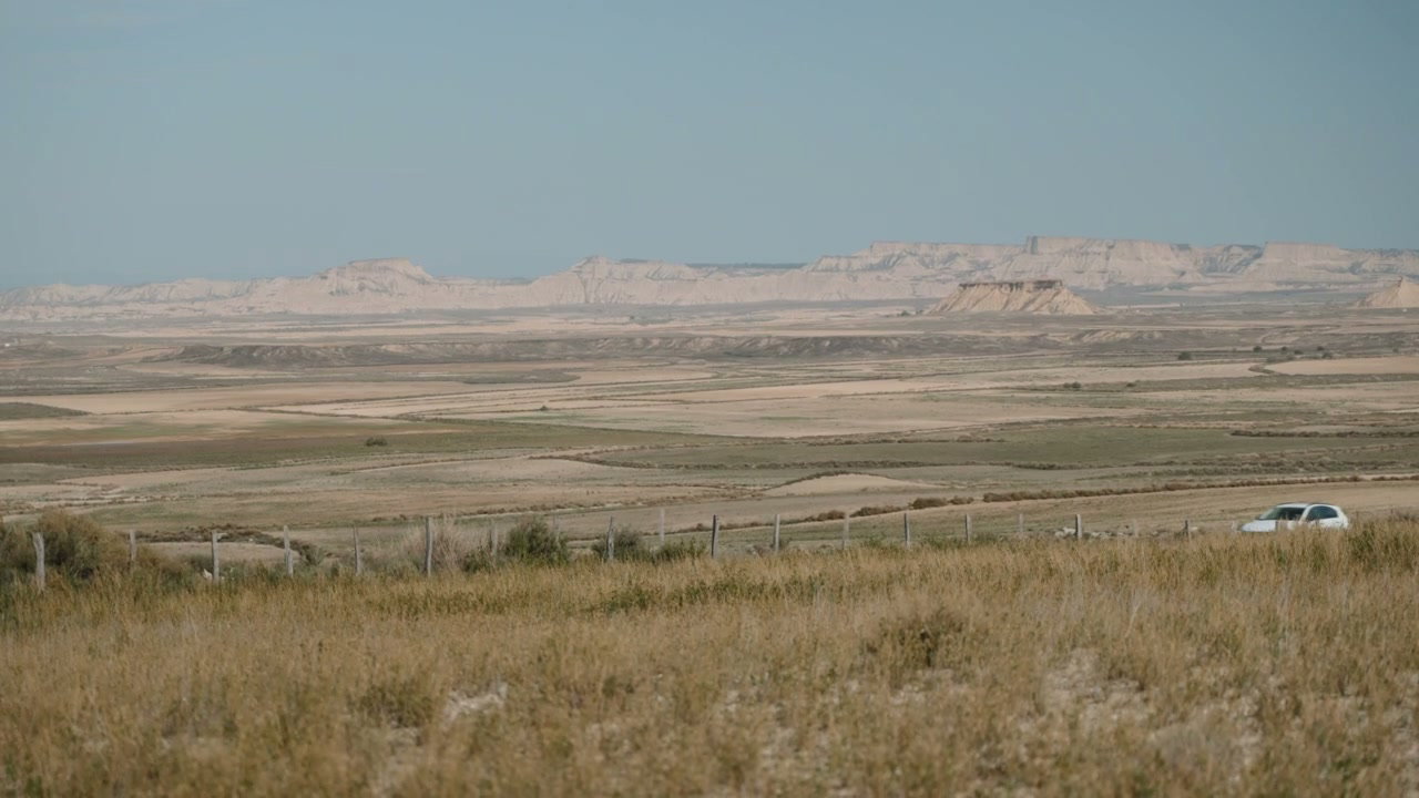 Car Driving Through Dry Landscape in Northern Spain