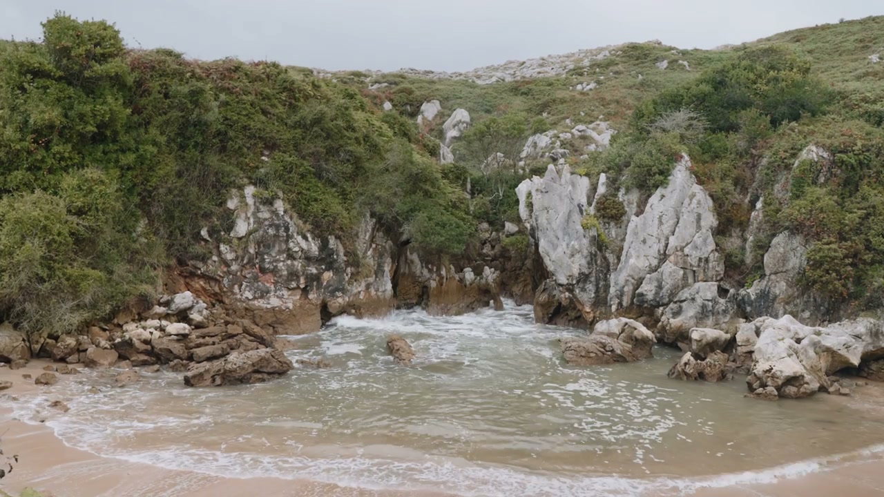 Rocky Cove and Sandy Beach in Northern Spain