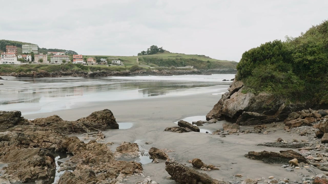 Rocky Beach and Coastal Town in Northern Spain