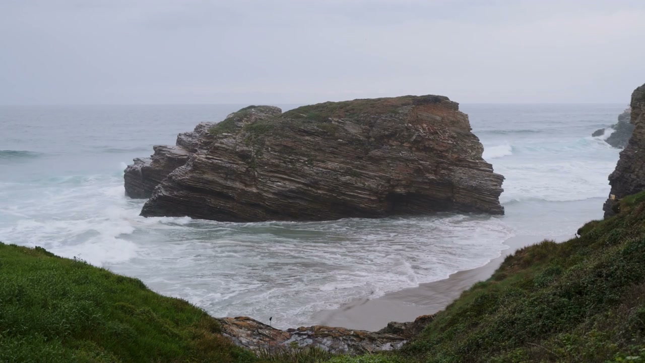 Ocean Waves Crashing on Rocky Coastline
