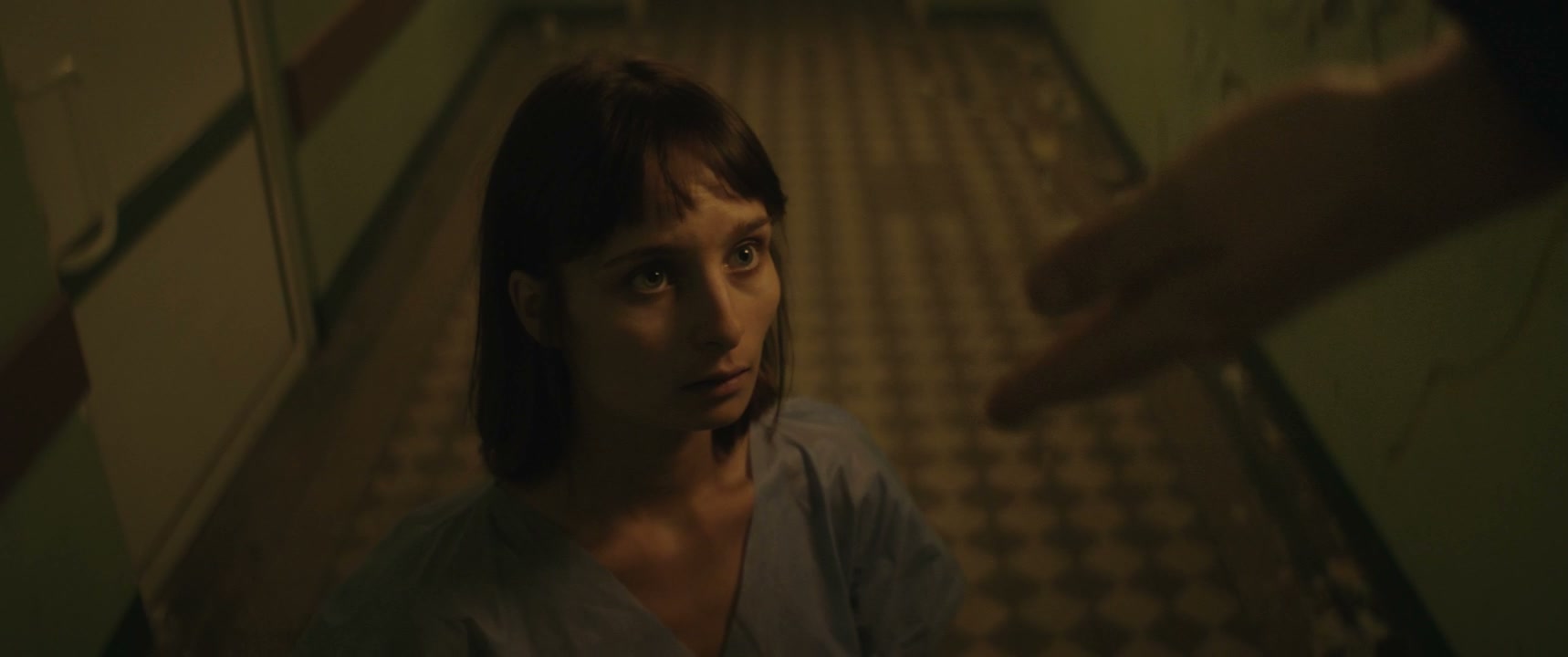 Distressed Woman in Abandoned Hospital