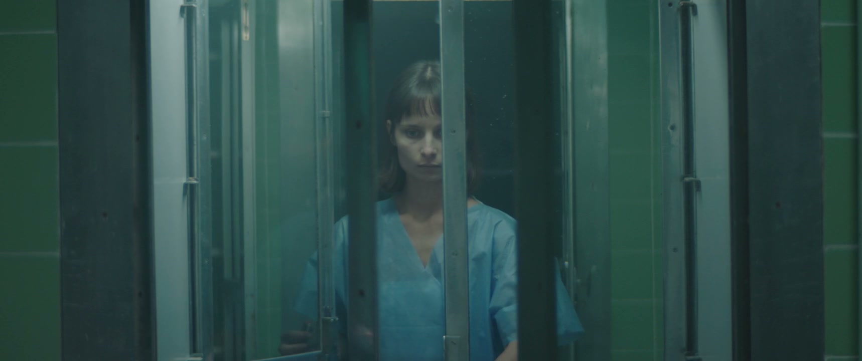 Distressed Woman in Hospital Ward