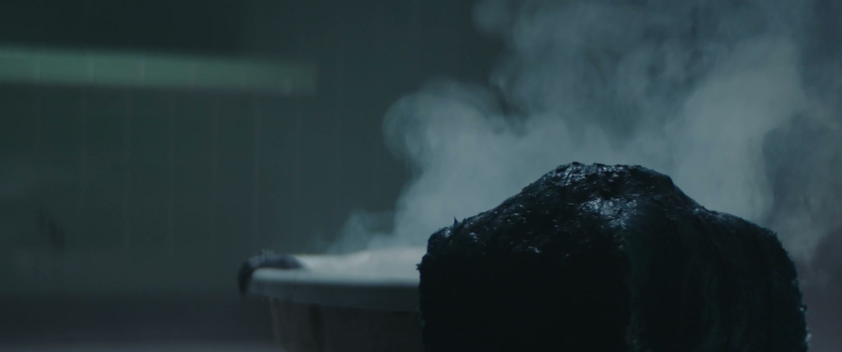 Zombie Rising from Steaming Bathtub