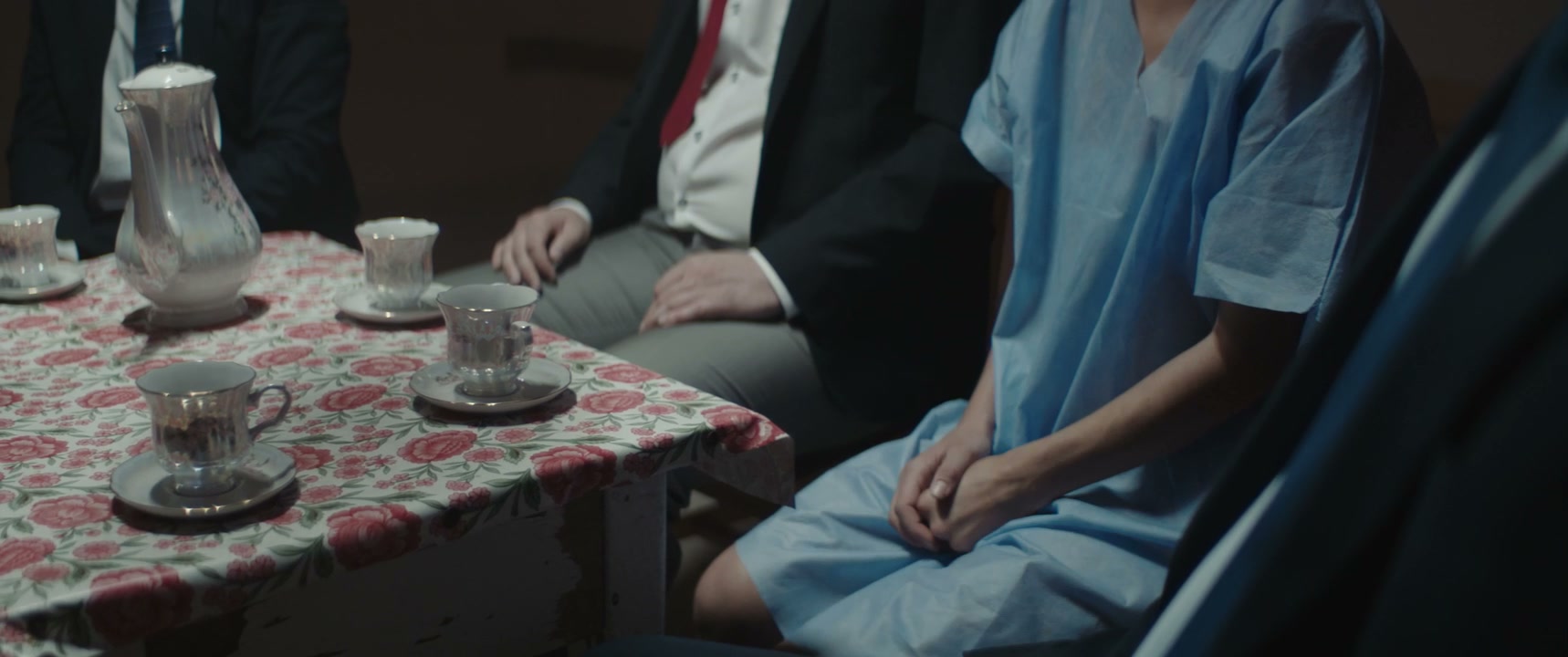 Patient Sitting at Table with Group