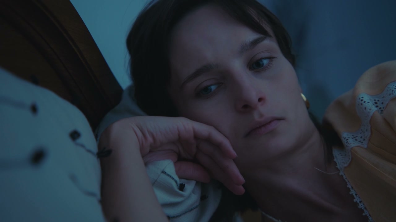 Anxious Woman Wakes From Sleep