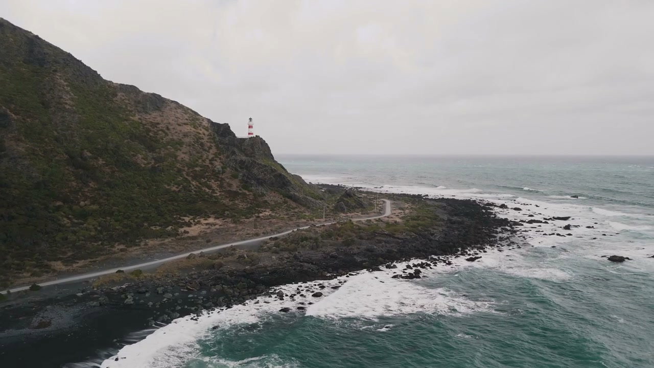 Lighthouse on Rugged New Zealand Coast