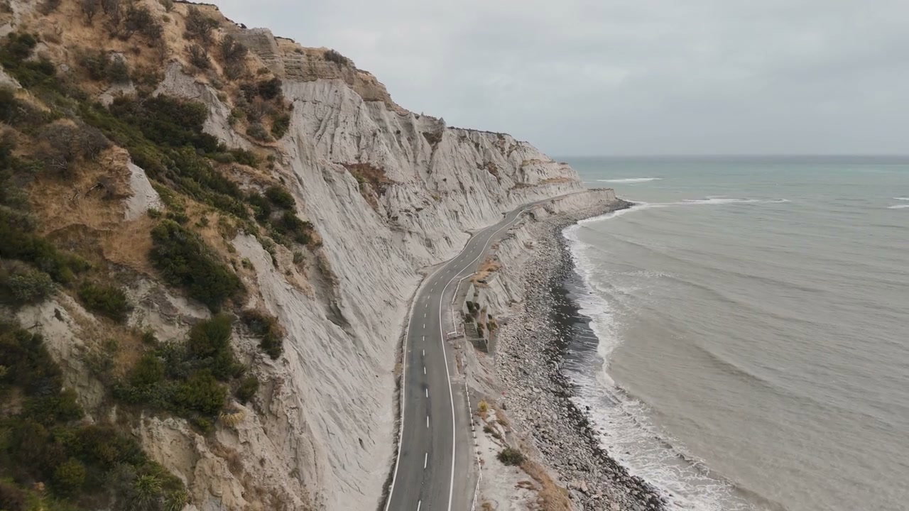 New Zealand Coastal Road Winding Along Cliffs