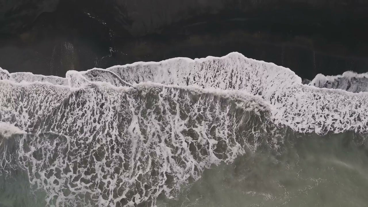 Ocean Waves Crashing on New Zealand Black Sand Beach