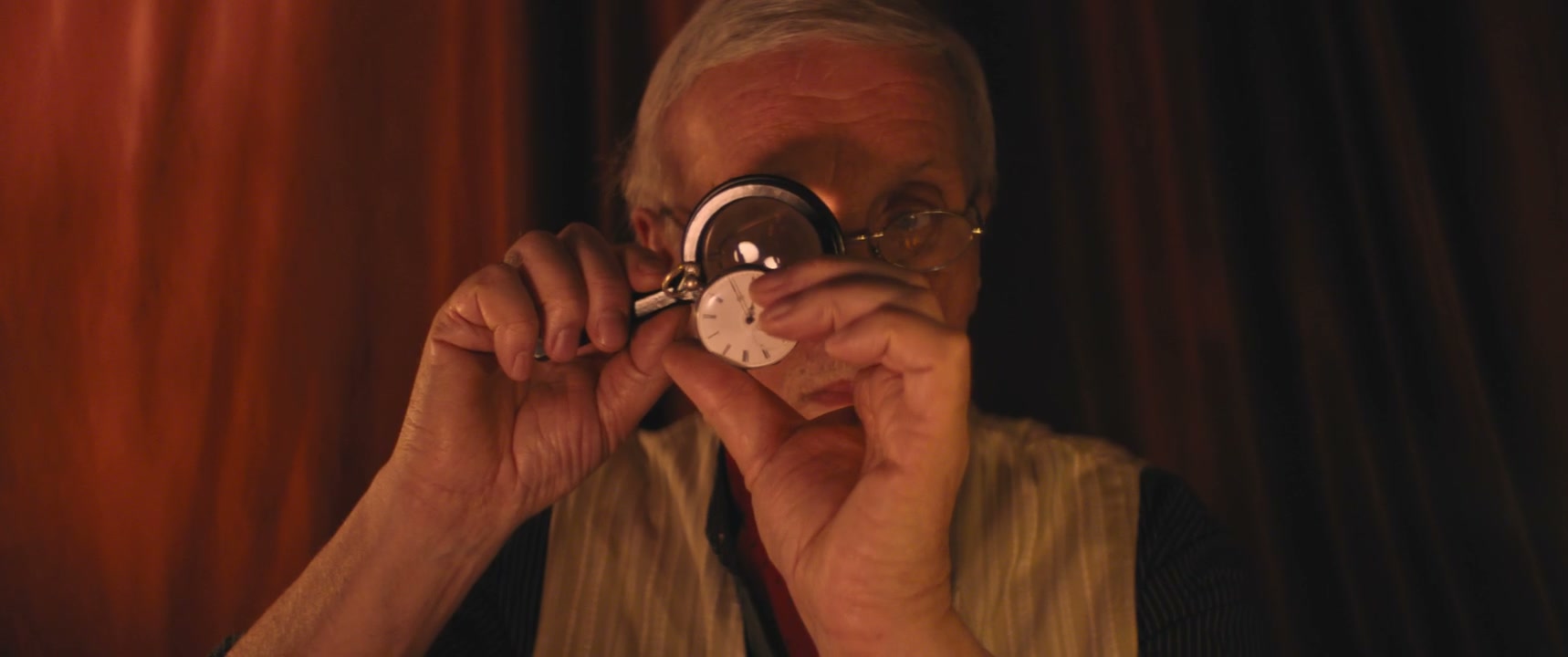 Vintage Man Examining Pocket Watch
