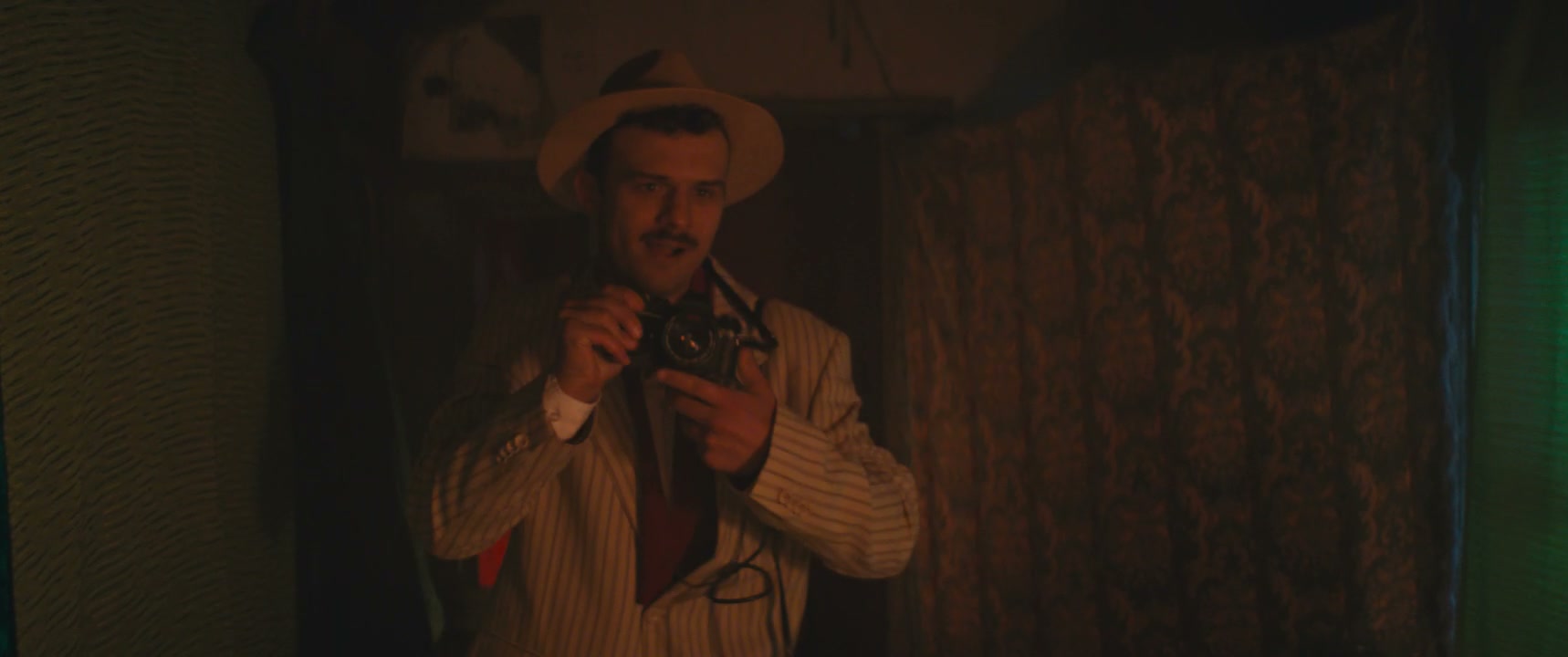 Retro Photographer Taking Photos with Flash
