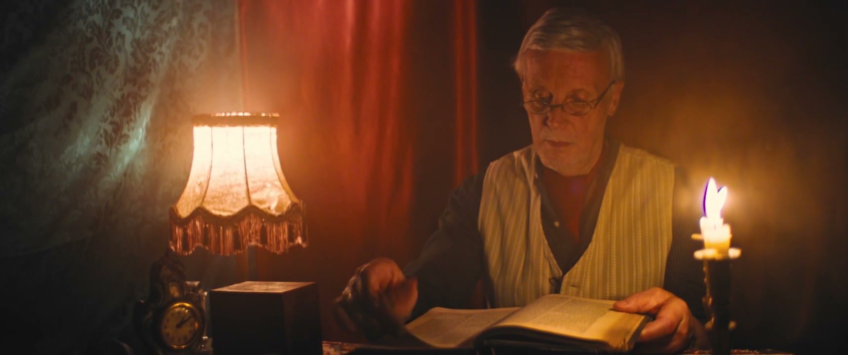 Man Reading Book in Retro Interior