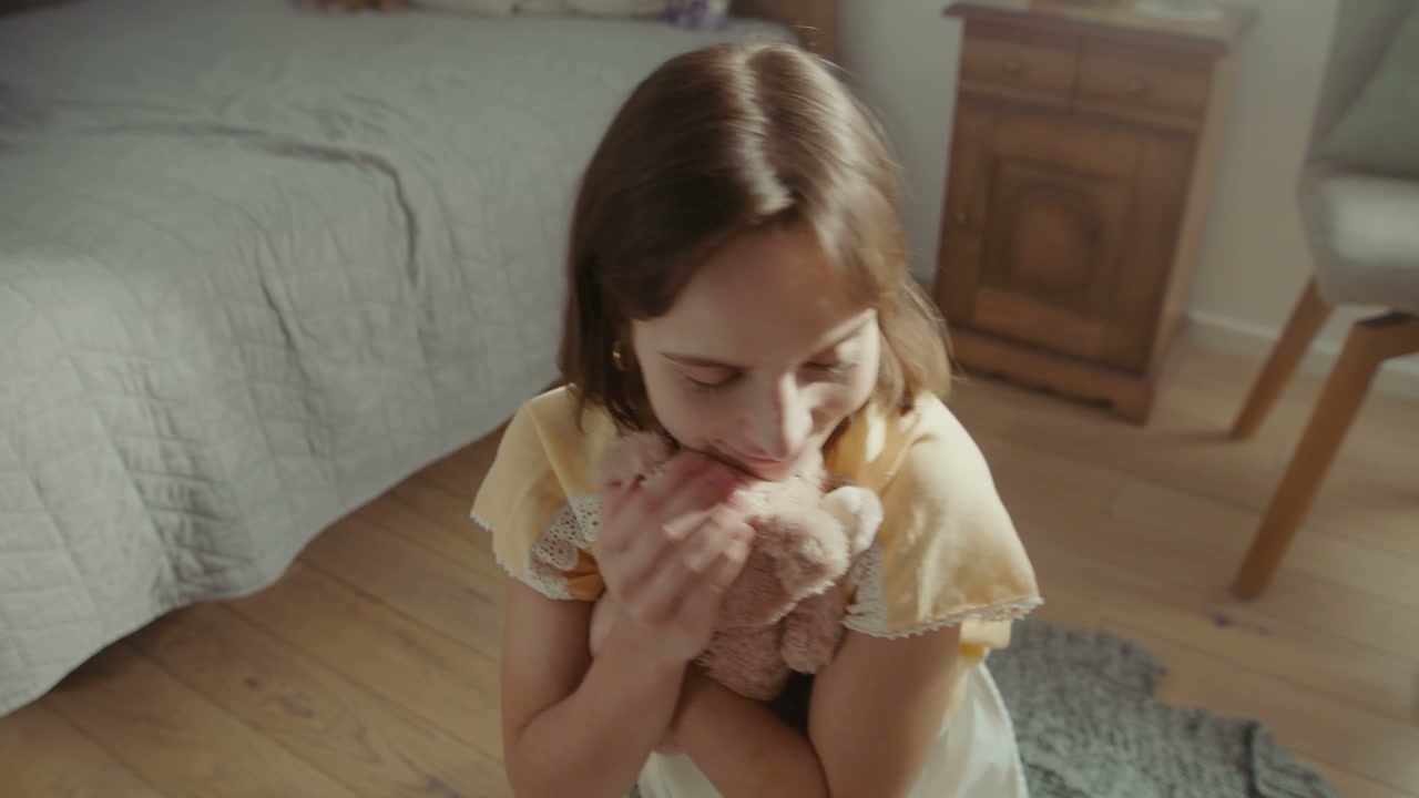 Woman Hugging Teddy Bear