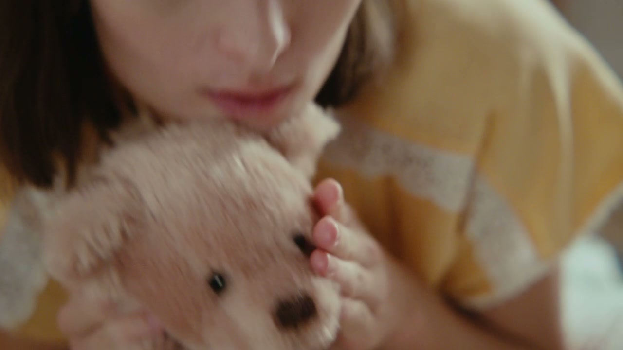 Woman Hugging Teddy Bear