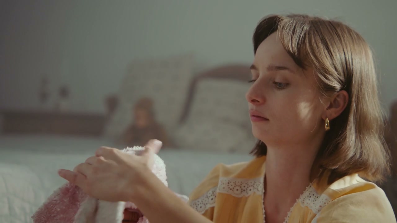 Woman Playing With Pink Stuffed Bunny