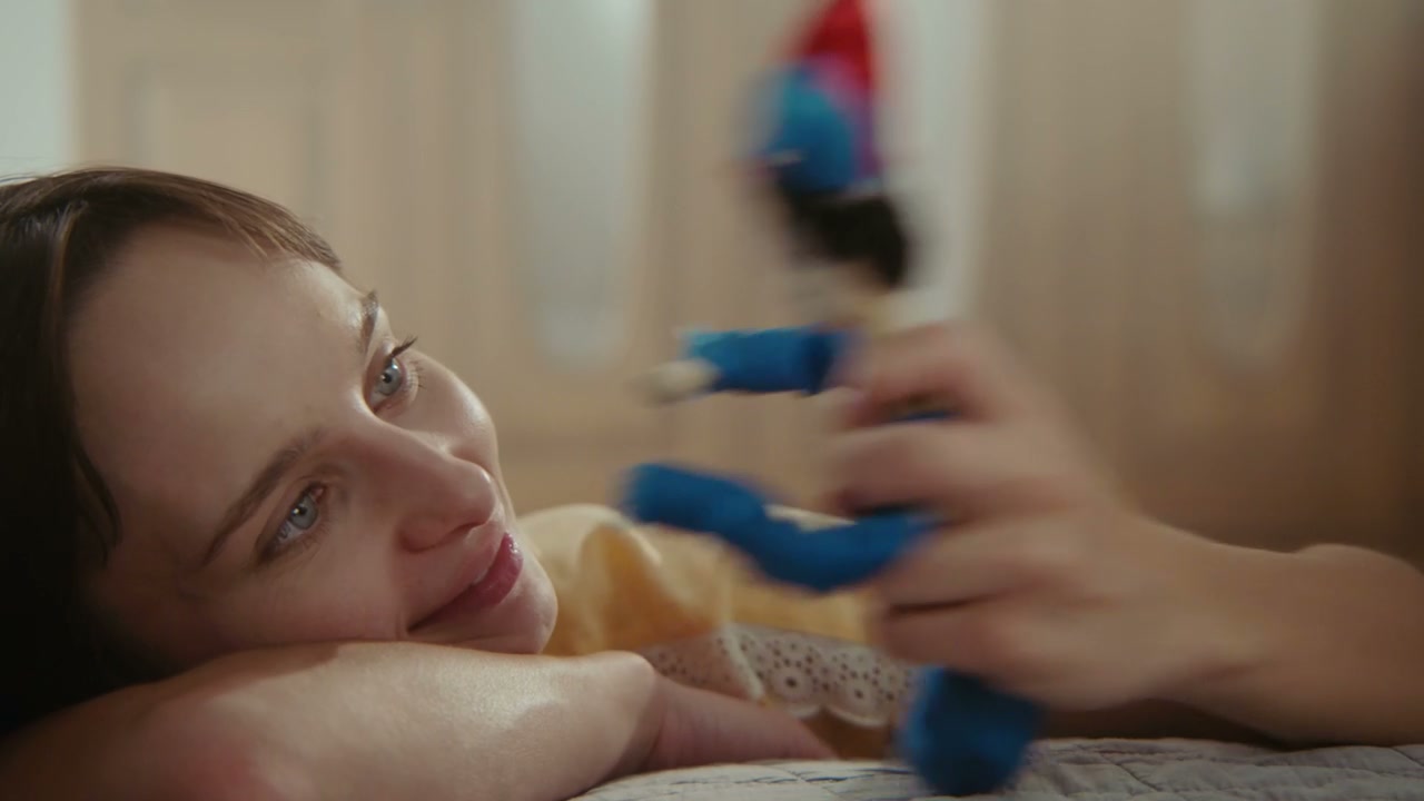 Woman Playing With Jester Puppet