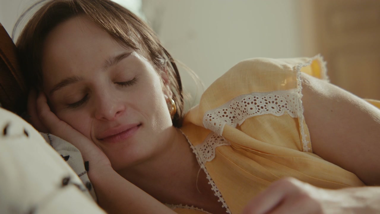 Woman Relaxing in Bed