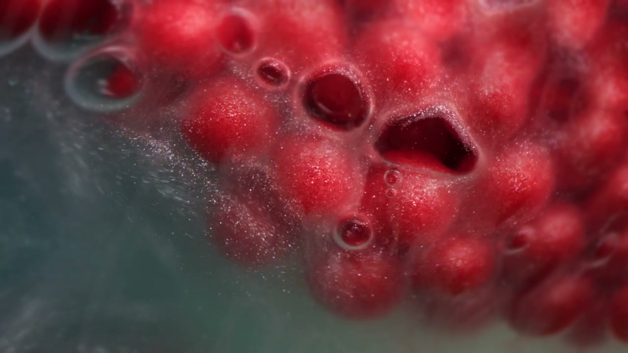 Bubbling Red Particles in Liquid