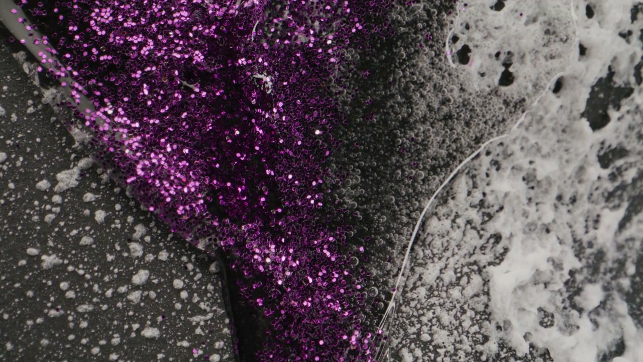 Purple Glitter Liquid with White Foam